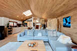 Experience luxury living in this stunning property, showcasing a modern interior with a focus on natural materials.
