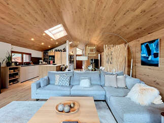 Experience luxury living in this stunning property, showcasing a modern interior with a focus on natural materials.