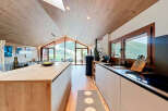 Experience luxury living in this stunning kitchen with a modern design.