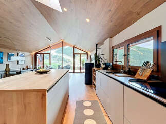 Experience luxury living in this stunning kitchen with a modern design.