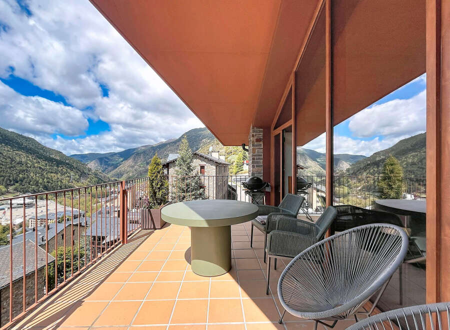 Enjoy breathtaking mountain views from this stunning property's expansive balcony.