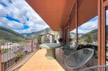 Enjoy breathtaking mountain views from this stunning property's expansive balcony.