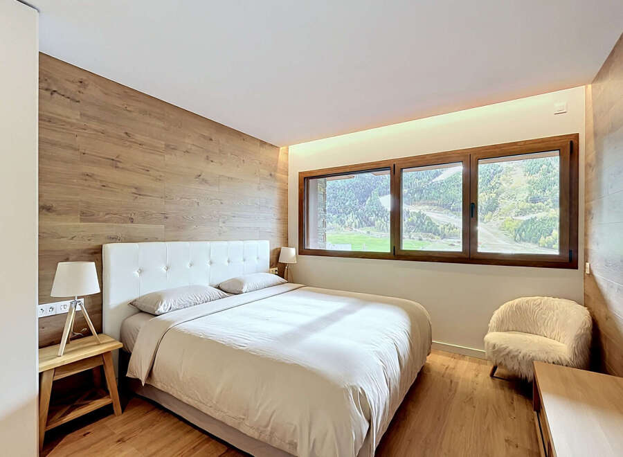 Discover the epitome of comfort and style in this stunning bedroom.