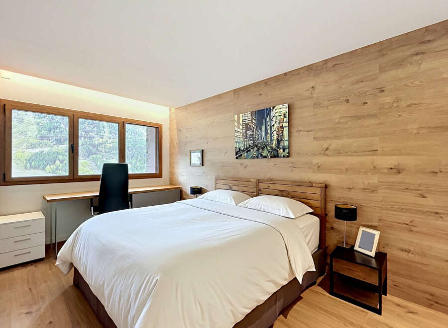 Experience luxury and comfort in this stunning bedroom.
