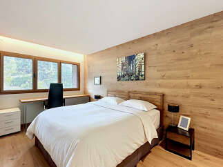 Experience luxury and comfort in this stunning bedroom.