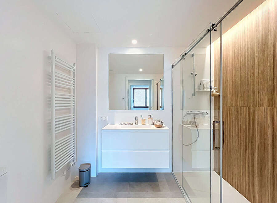 Step into a modern bathroom oasis, meticulously designed for both style and functionality.