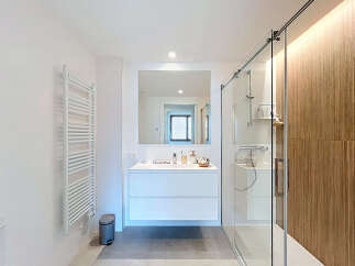 Step into a modern bathroom oasis, meticulously designed for both style and functionality.