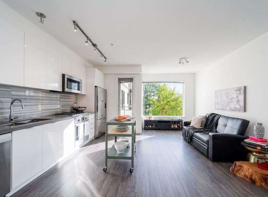 Experience modern living in this stunning property! This home boasts a sleek, contemporary kitchen with stainless steel appliances and ample counter space.