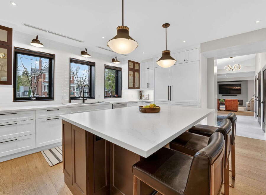 This stunning kitchen boasts a modern design with a spacious island, perfect for entertaining.