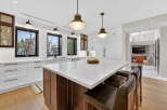 This stunning kitchen boasts a modern design with a spacious island, perfect for entertaining.