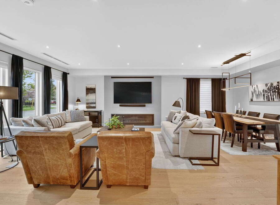 Step into luxury with this stunning living space, featuring a modern design and high-end finishes.