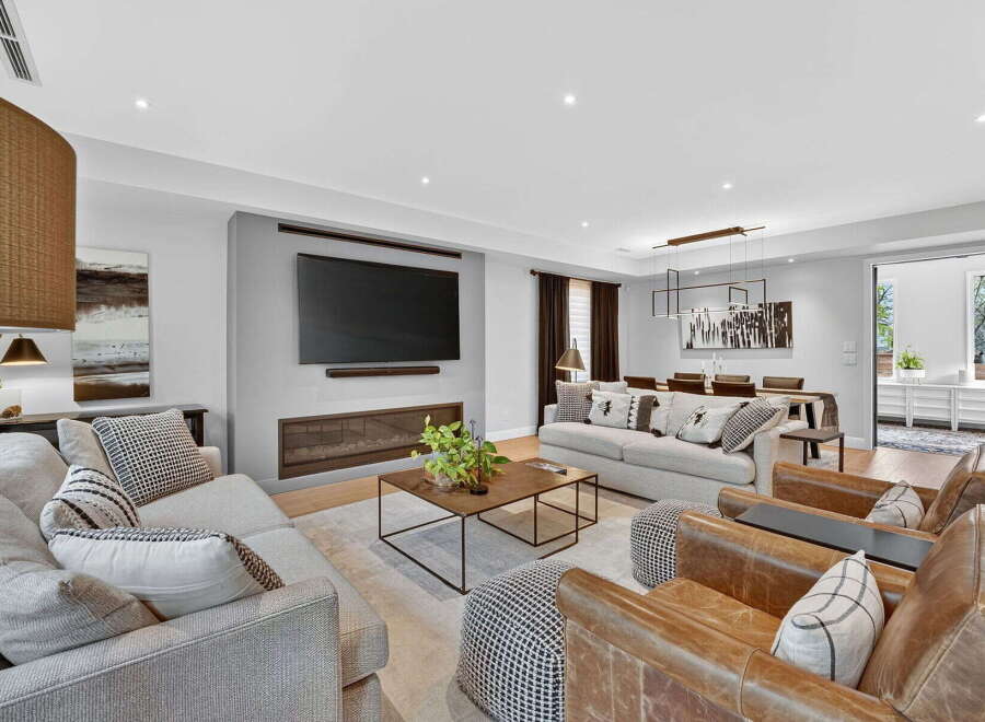 This stunning living room boasts a modern design with a cozy ambiance.