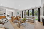 Step into luxury with this stunning living room, featuring a spacious layout and elegant design.