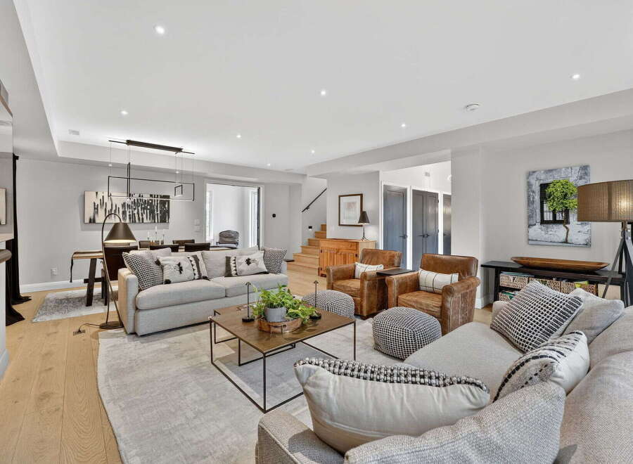 Step into luxury with this stunning living space, featuring a modern design and high-end finishes.