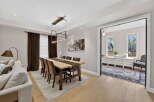 Step into luxury with this stunning dining room, featuring a modern aesthetic and elegant design.