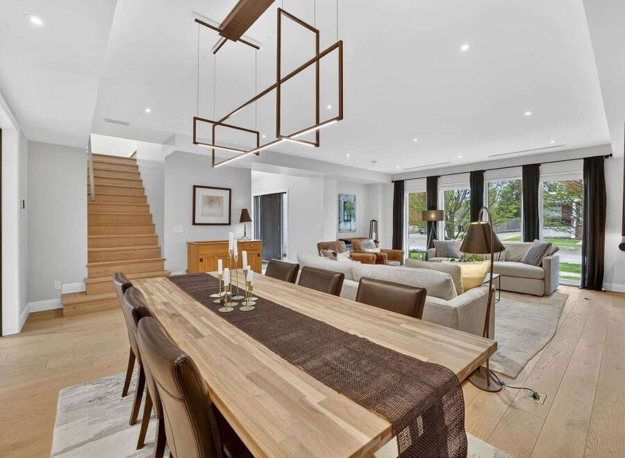 Step into luxury with this stunning property featuring a spacious open-concept living area.