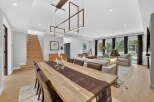 Step into luxury with this stunning property featuring a spacious open-concept living area.