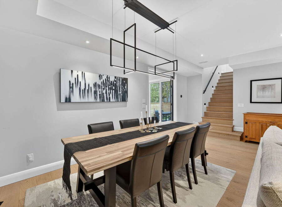 Step into luxury with this stunning dining room, featuring a modern design and elegant finishes.