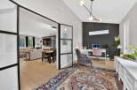 Step into luxury with this stunning property featuring a modern home office.