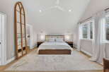 Step into this stunning bedroom, featuring a luxurious king-size bed and a spacious layout.