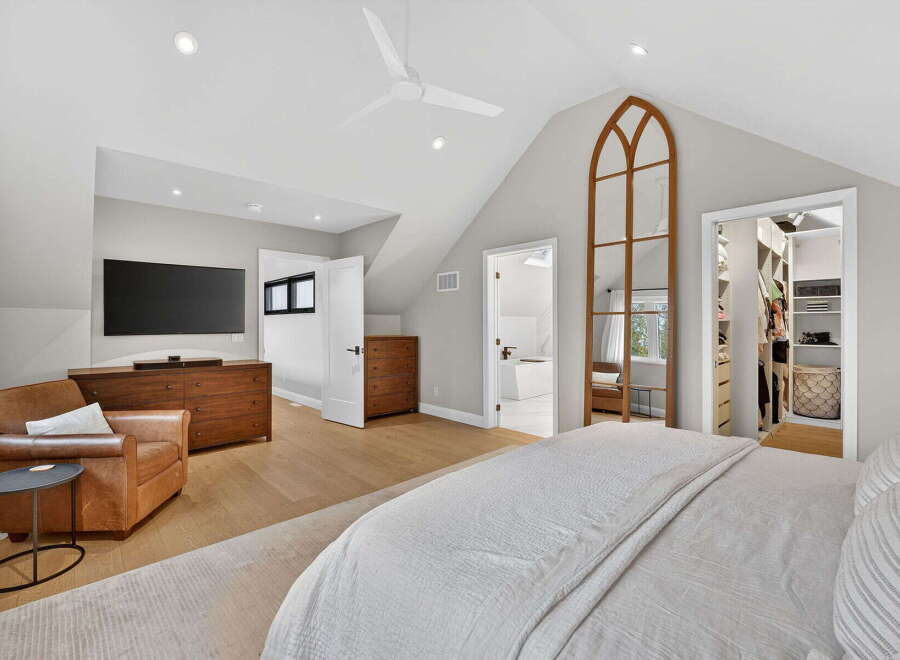 Step into luxury with this stunning bedroom featuring a spacious layout and elegant design.