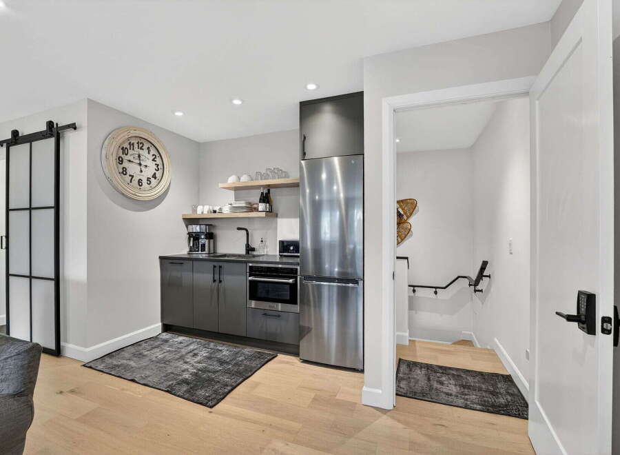 Discover this stylish and functional kitchen space, perfect for modern living.