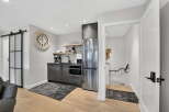 Discover this stylish and functional kitchen space, perfect for modern living.
