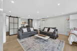 Discover modern living in this stylish apartment featuring a cozy living area with two comfortable sofas and a chic coffee table.