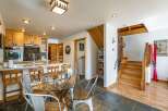 Step into this stunning property featuring a beautifully designed kitchen with custom cabinetry and a stylish breakfast bar.