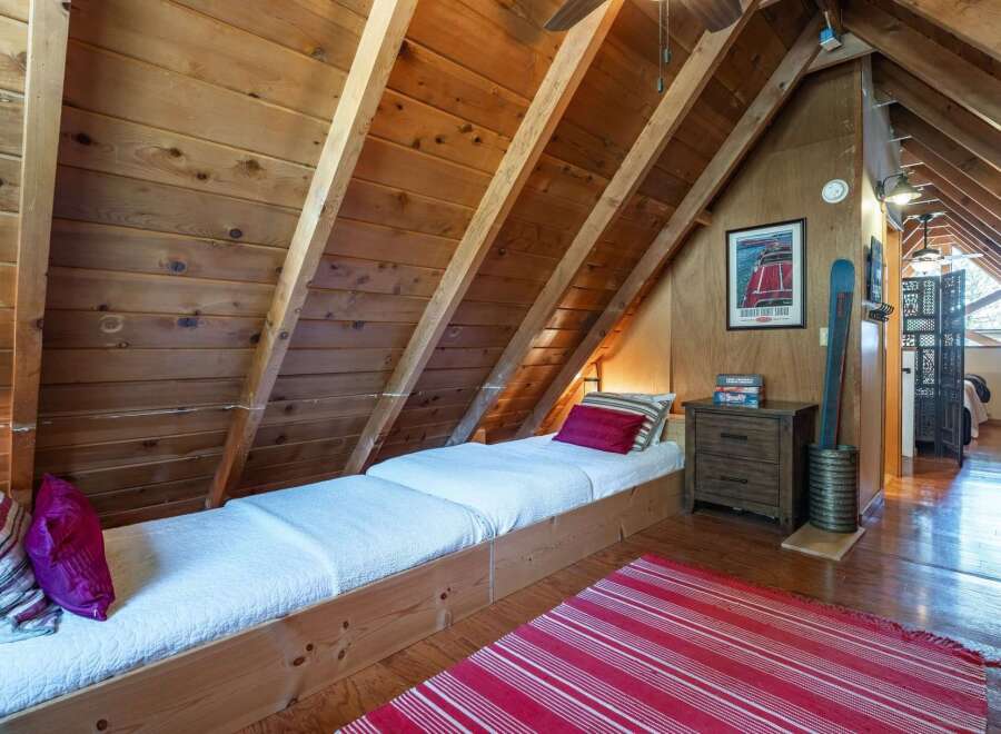 Discover the charm of this cozy bedroom, perfect for a relaxing retreat.