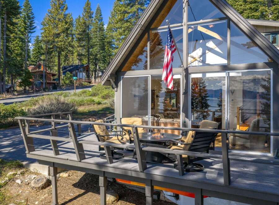 Enjoy stunning views from this charming cabin! This property features a spacious deck with a cozy fire pit, perfect for entertaining or relaxing.