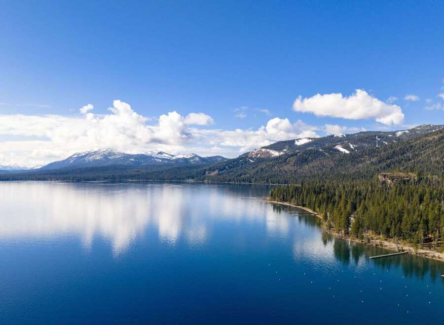 Experience the tranquility of lakeside living with this stunning property.