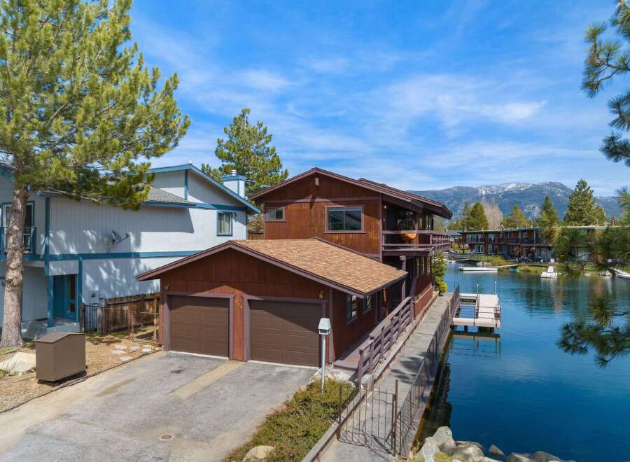 Discover waterfront living at its finest! This stunning property boasts a prime location with direct access to the water, perfect for boating and enjoying scenic views.