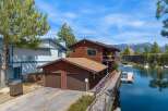 Discover waterfront living at its finest! This stunning property boasts a prime location with direct access to the water, perfect for boating and enjoying scenic views.