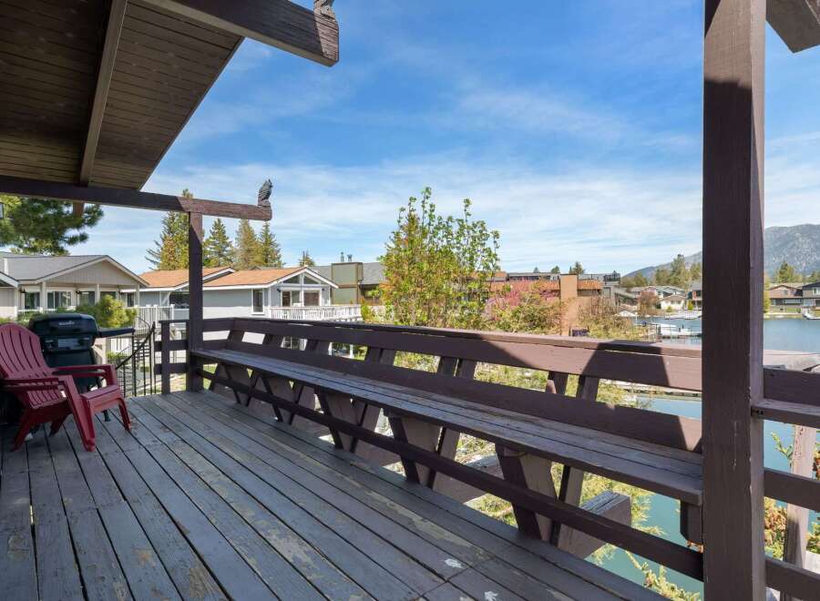 Enjoy stunning lake views from this charming property's spacious deck.