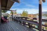 Enjoy stunning lake views from this charming property's spacious deck.
