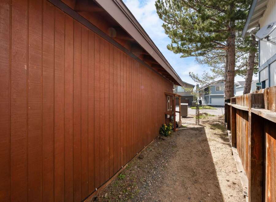This property boasts a charming exterior with a warm, inviting color palette.