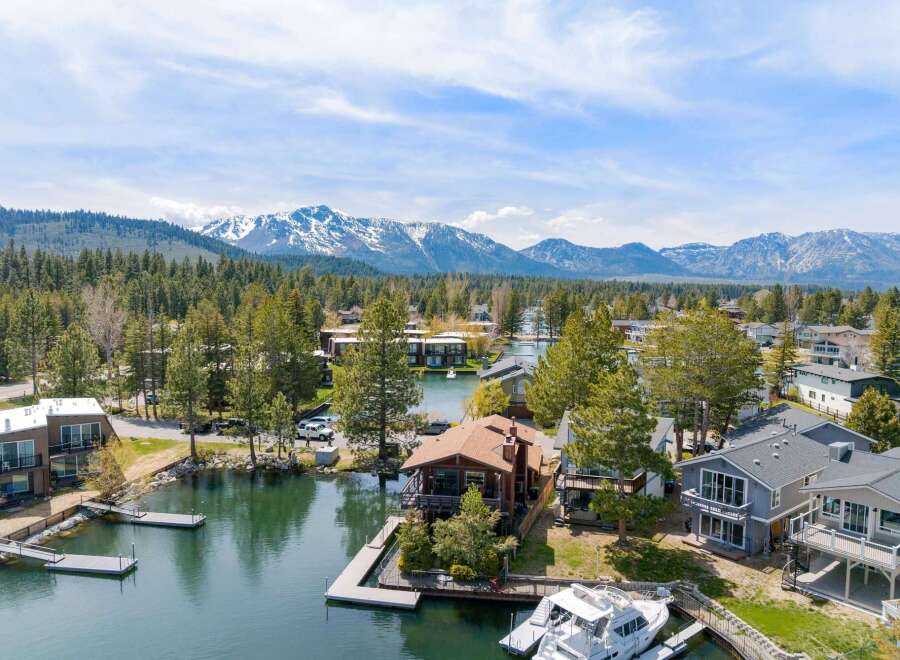 Discover your dream waterfront retreat! This stunning property boasts a private dock, perfect for boating and enjoying the serene lake.