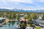 Discover your dream waterfront retreat! This stunning property boasts a private dock, perfect for boating and enjoying the serene lake.
