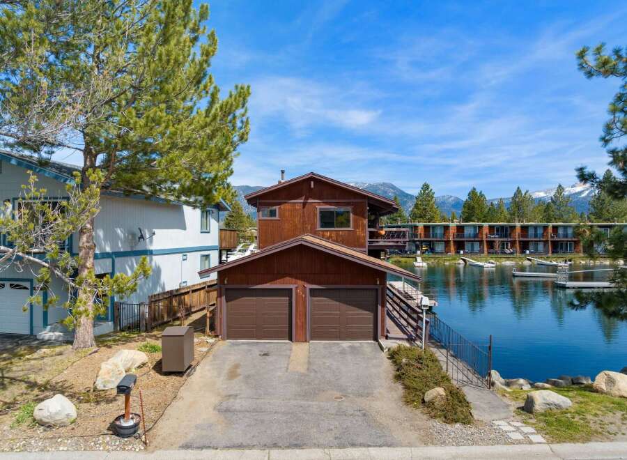 Discover waterfront living at its finest! This stunning property boasts a prime location with direct access to the water, perfect for boating and enjoying scenic views.