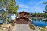 Discover waterfront living at its finest! This stunning property boasts a prime location with direct access to the water, perfect for boating and enjoying scenic views.