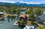 Discover waterfront living at its finest! This stunning property boasts a private dock, perfect for boating and enjoying the serene lake.
