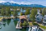 Discover waterfront living at its finest! This stunning property boasts a private dock, perfect for boating and enjoying the serene lake.