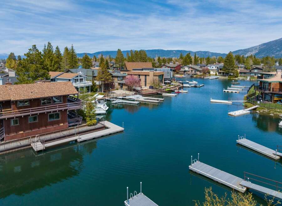 Discover waterfront living at its finest! This stunning property boasts a prime location with direct access to the water.