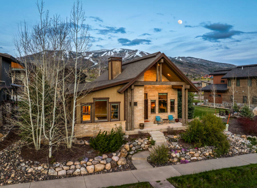 This stunning mountain home offers a perfect blend of luxury and natural beauty.
