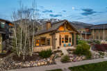 This stunning mountain home offers a perfect blend of luxury and natural beauty.