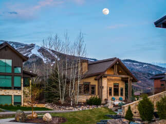 This stunning property offers a luxurious mountain living experience.