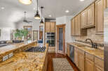 This stunning kitchen boasts a spacious layout with a large island, perfect for entertaining.
