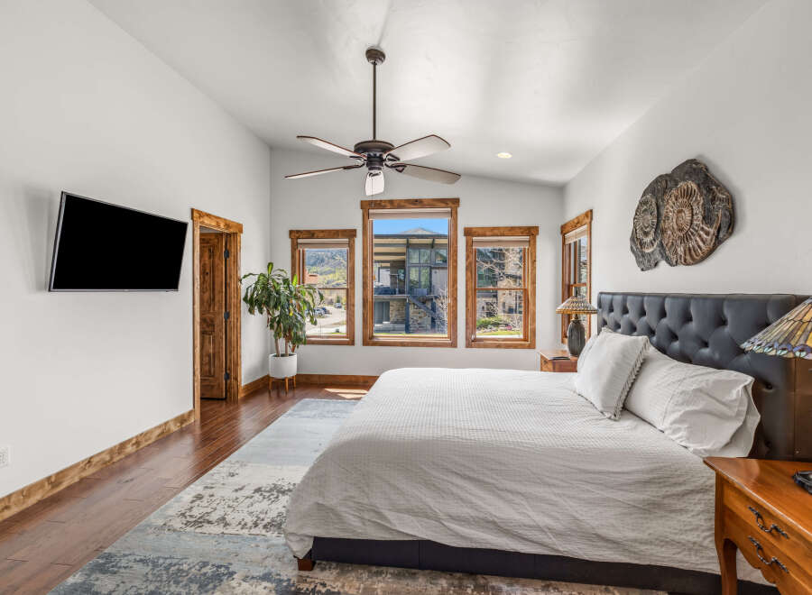 Step into luxury in this stunning bedroom, featuring a spacious layout and elegant design.