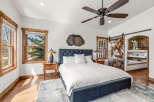 Step into luxury with this stunning bedroom, featuring a plush bed and elegant nightstands.